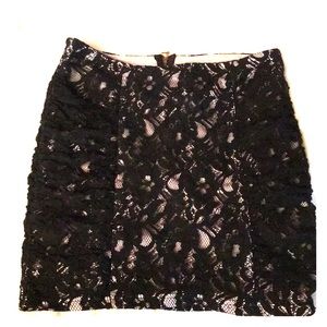 Black and Nude lace miniskirt